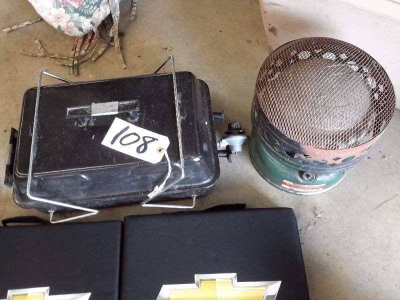 lot 108 image: Propane table top grill, Coleman Heater, 2 CHEVROLET Seat Cushions