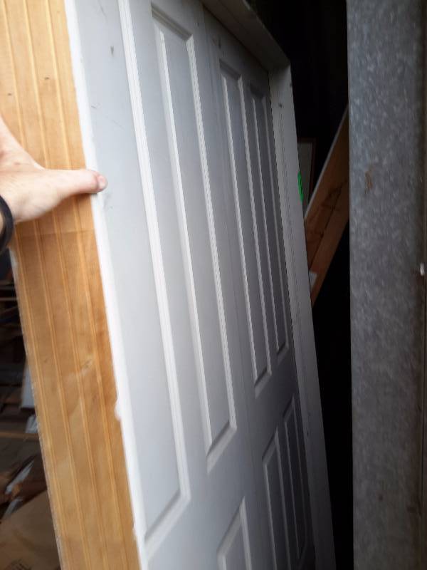 lot 162 image: Double door set.. Solid core.  61 12 in x 81 12 in. No hardware other than hinges. NEW