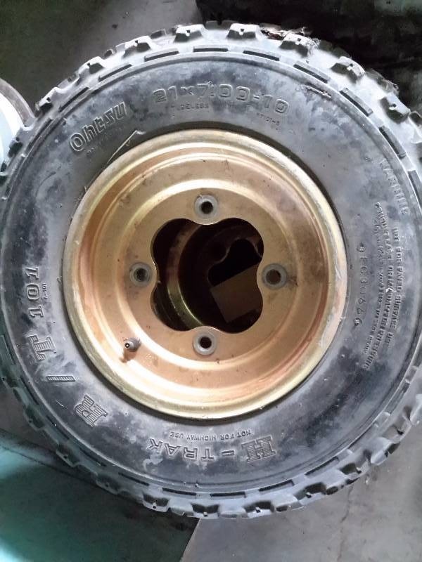 lot 173 image: Set of ATV Tires.. 2, 22 x 11  2, 21 x 7 - 10..