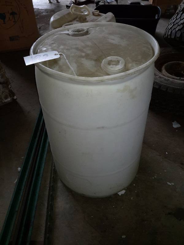 lot 192 image: 1, 50 gallon 1, 30 gallon plastic barrels  2, 102in and 2, 72in metal fence posts