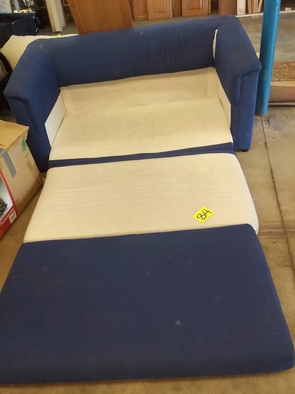 lot 84 image: Love seat fold out bed combo