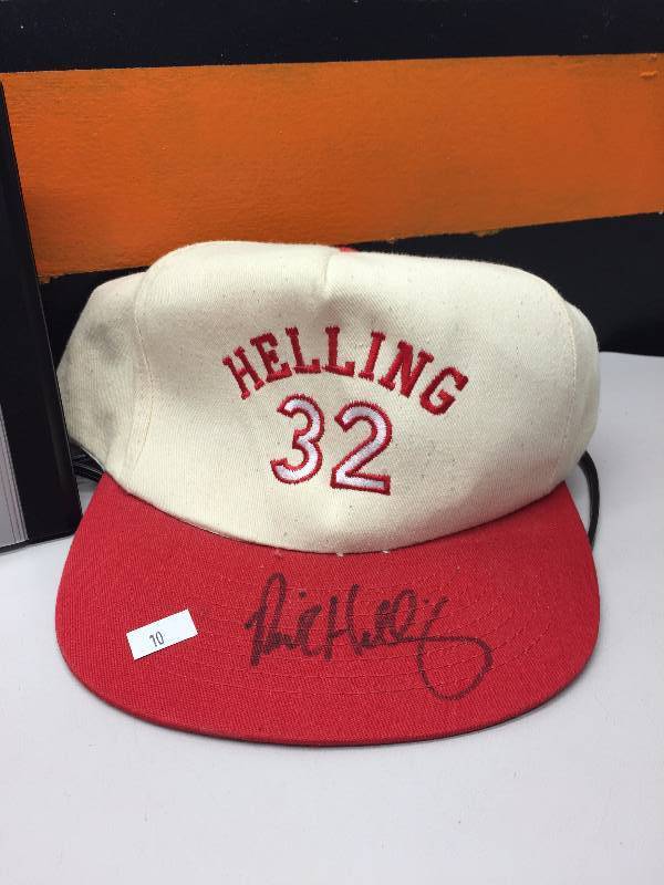 lot 10 image: VIKINGS ALARM CLOCK, HELLING AUTOGRAPHED HAT AND 61 FOR 61 HAT