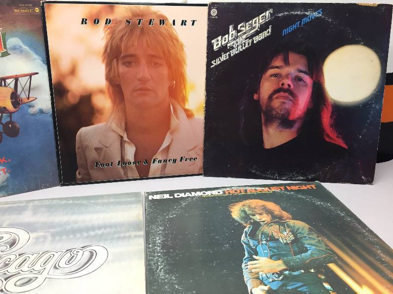 lot 11 image: JOE WALSH THE SMOKE YOU DRINK THE PLAY YOU SET, ROD STEWART FOOT LOOSE AND FANCY FREE, BOB SEGER SILVER BULLET
