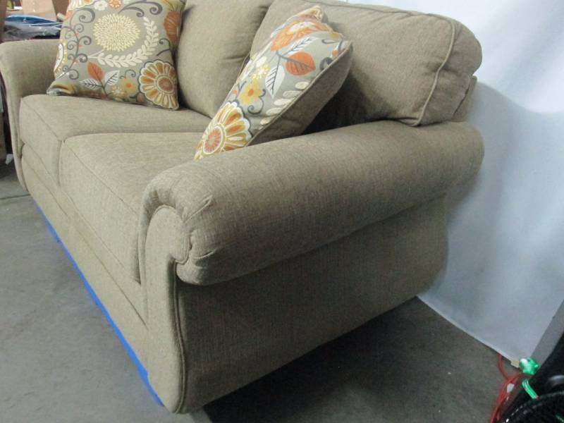 lot 1 image: Ashley Furniture Tailya Loveseat