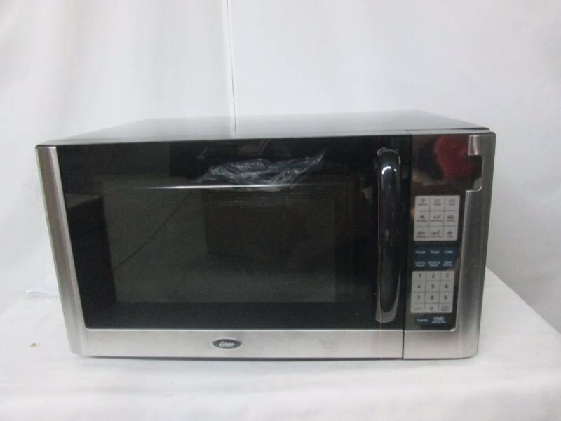 lot 16 image: Oster 1.4 cu. ft. 1200-Watt Microwave Oven