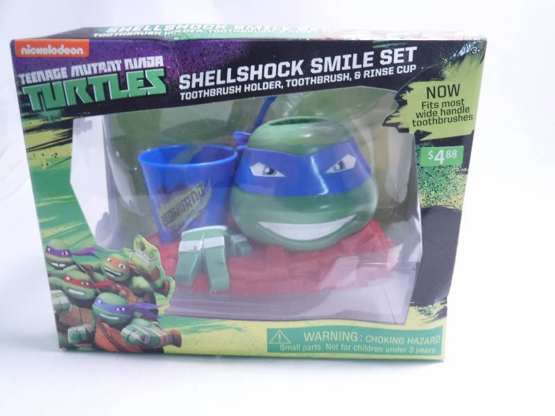 lot 5 image: Teenage Mutant Ninja Turtles Toothbrush Set - NIB