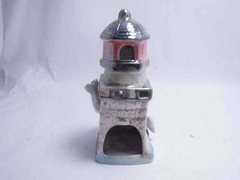 lot 24 image: Aquarium Dcor - Lighthouse wDolphins