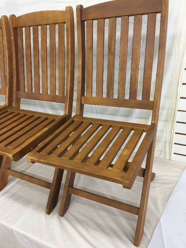 lot 32 image: 4 brand new wood folding chairs