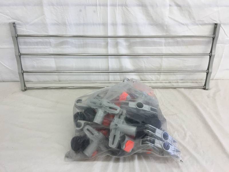 lot 35 image: multiple clothing racks