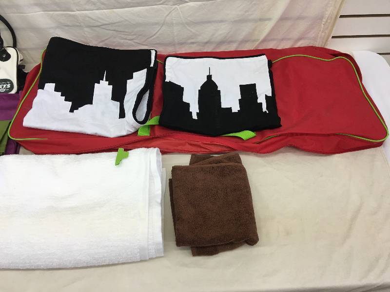 lot 174 image: assorted sheets,curtains,wrapping paper holder,ny jets purse
