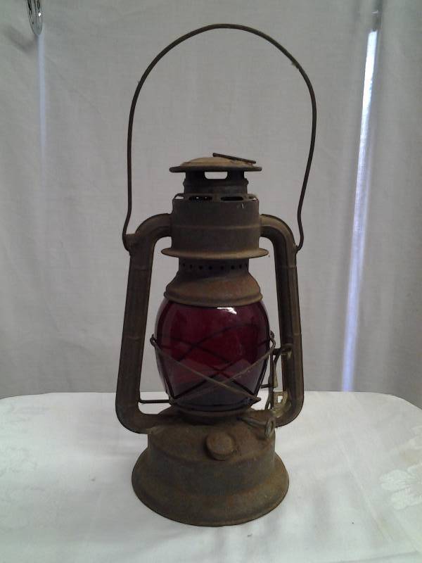 old lanterns with red glass