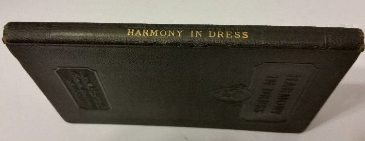 lot 86 image: Highly Collectable 1924 Edition of Harmony in Dress by Mary Brooks Picken - Womens Institute of Dommestic Arts and Sciences