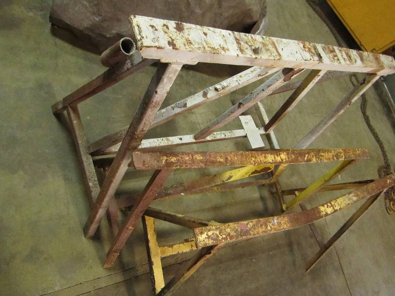 lot 65 image: 3 metal saw horses, one 54  two 48...