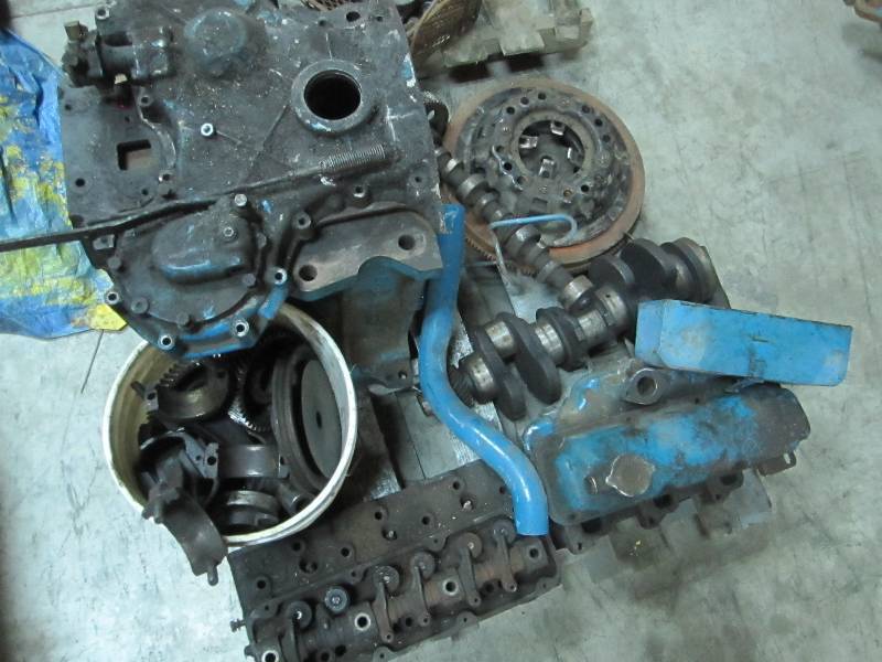 lot 75 image: Ford tractor engine parts...