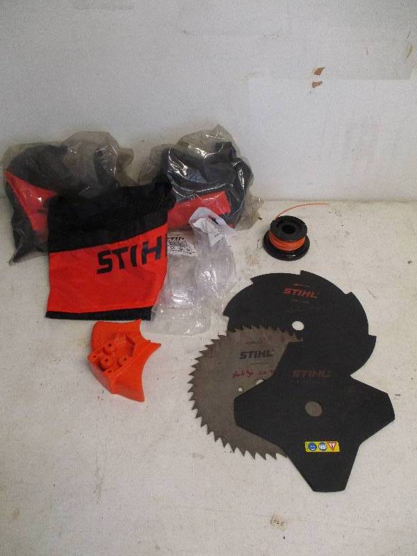 lot 27 image: Brush Cutter Weed Eater Accessories