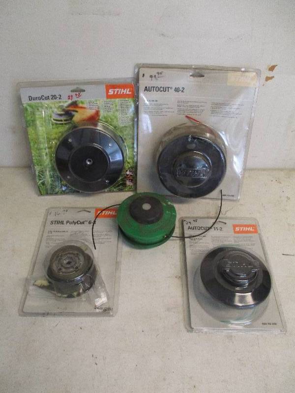 lot 28 image: Brush Cutter Weed Eater Accessories