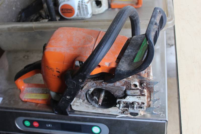 lot 879 image: Stihl Chain Saw