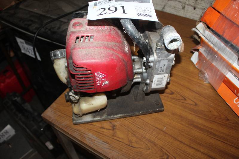 lot 291 image: Honda 1 Pump - Gas powered Needs Recoil