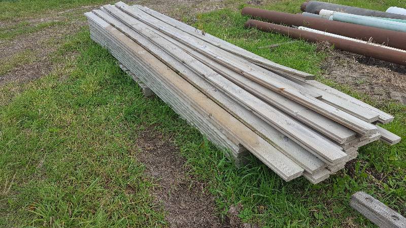 lot 1018 image: 2 x 6 Tongue and Groove green treated wood - 16 in length approximately (60)