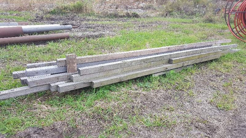 lot 1019 image: 4 x 4 green treated posts - 20 in length approximately (10)