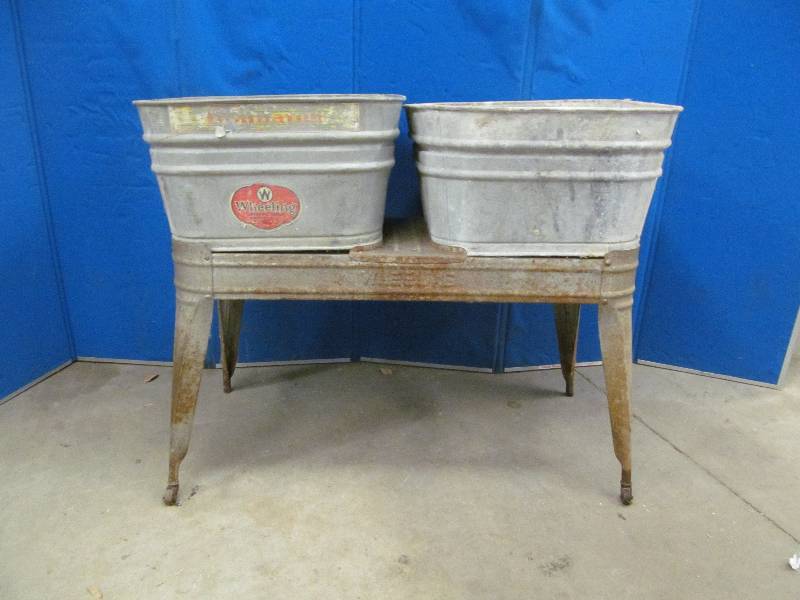 lot 1 image: Antique wheeling wash and rinse tub with stand