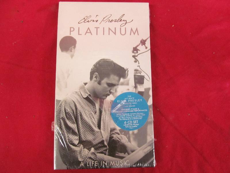 lot 67 image: Elvis Presley Platinum 4 cd set