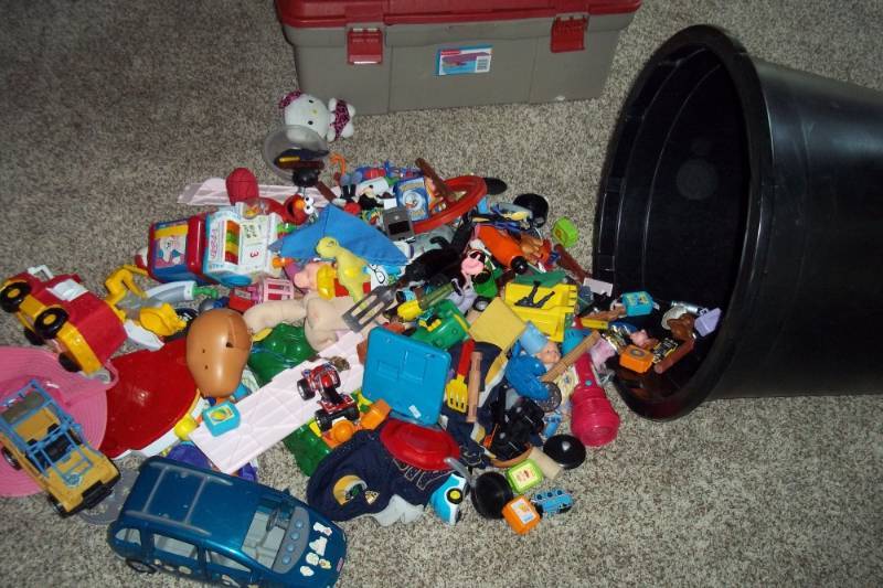 Large assortment of toys with black tub