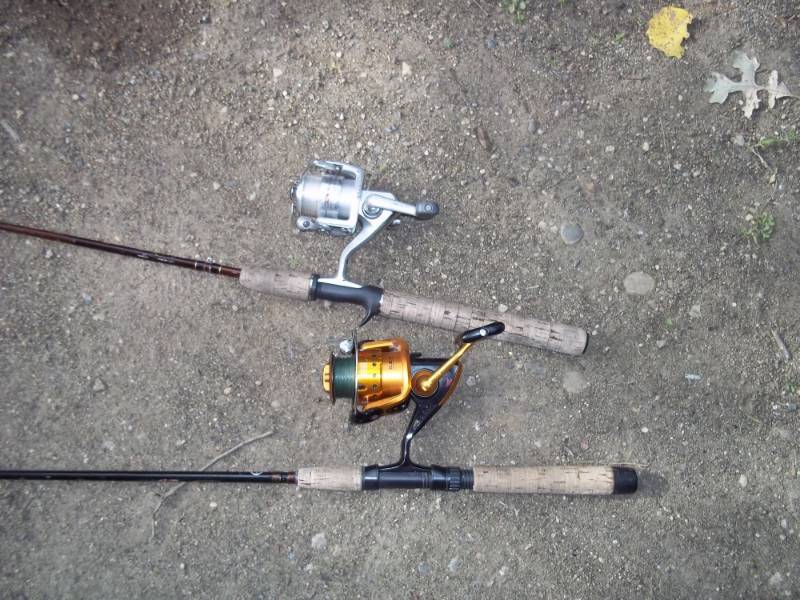 Pair of fishing poles with reels