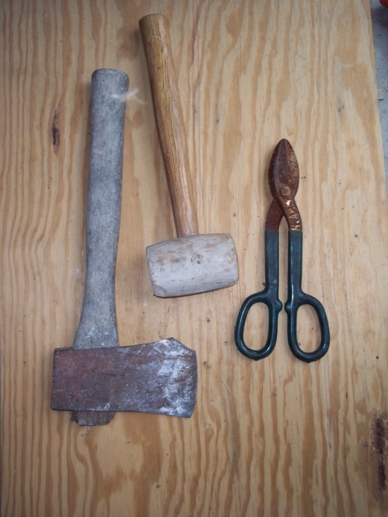 Hatchet, rubber mallet and tin snips