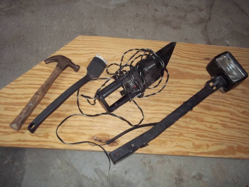 Hammer, paint scraper, 12v vacuum, and light