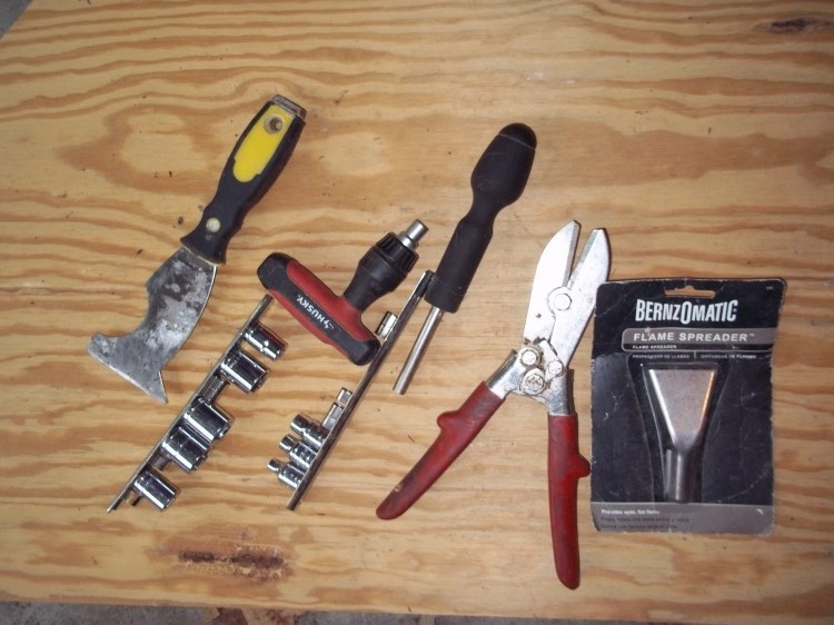 paint tool, sockets, trimmers, and flame spreader