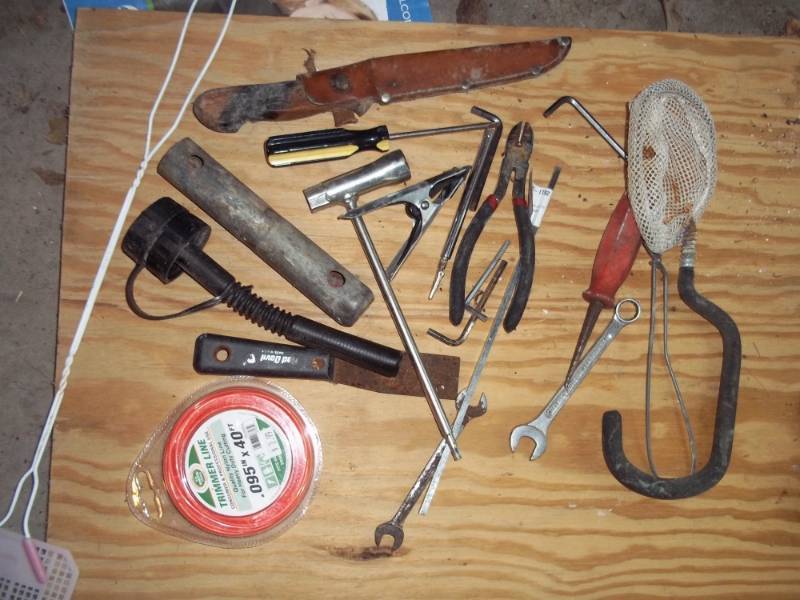 Screwdrivers, trimmer line and knife