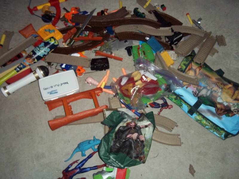 Toy train tracks and parts