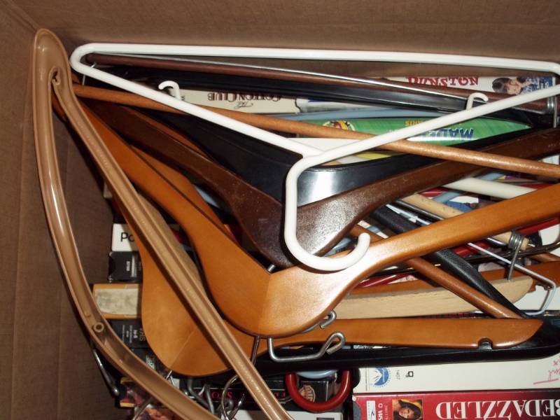 VHS movies and hangers