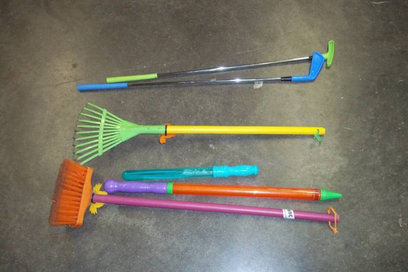 Kids yard tools and golf clubs