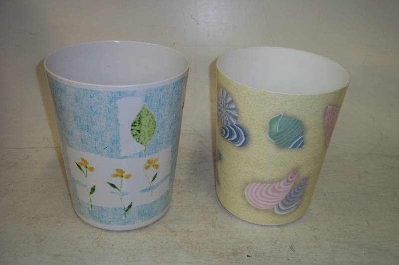 pair of garbage cans