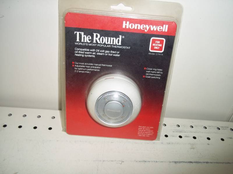 lot 91 image: Round Honeywell Thermostat