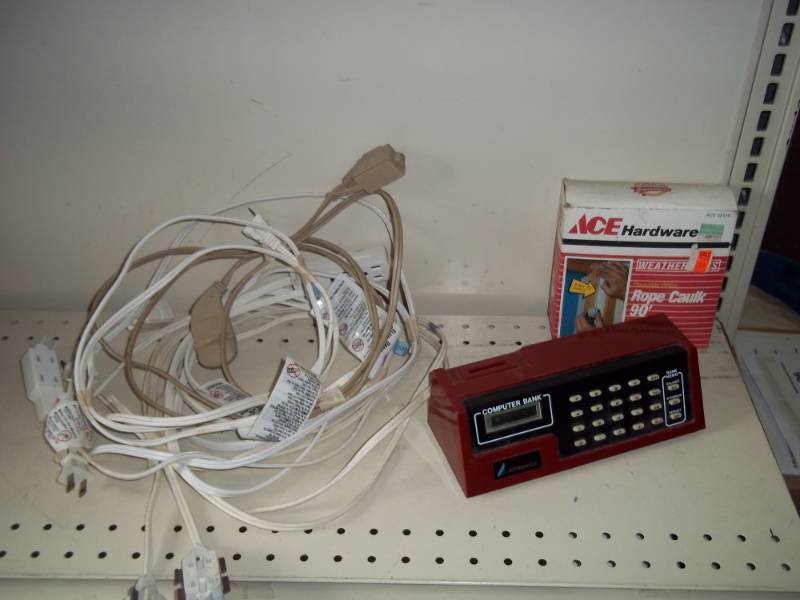 lot 94 image: Computer Bank, Extension Cords, Caulk Tape