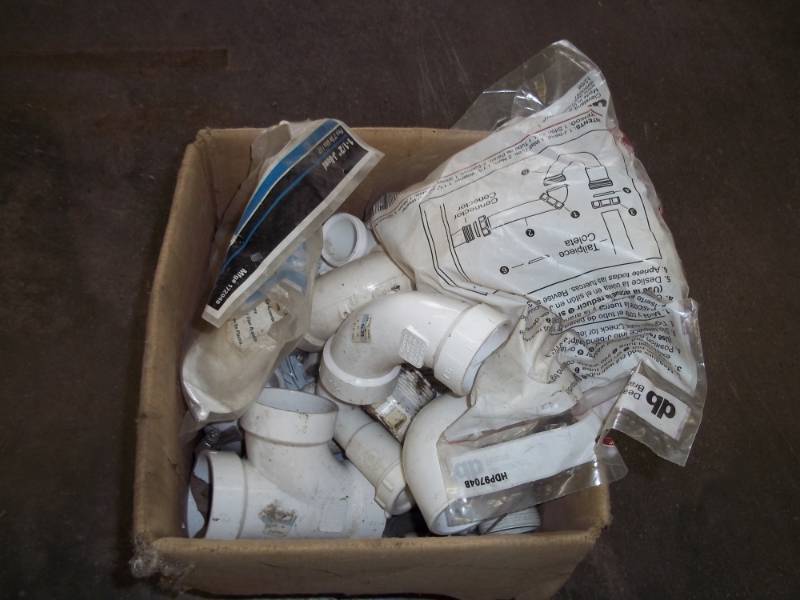 lot 165 image: Box of PVC plumbing parts