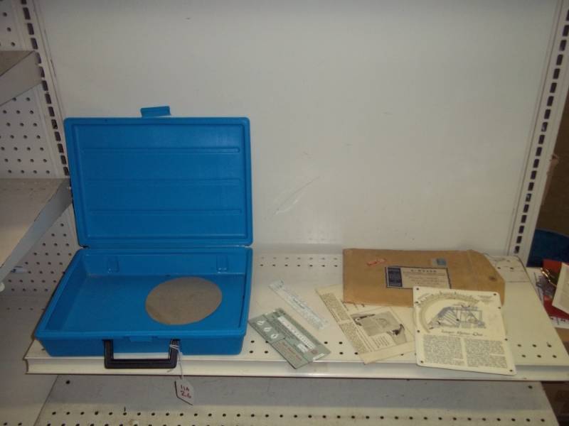 lot 187 image: Blue case with slide ruler and weyer rafter dial