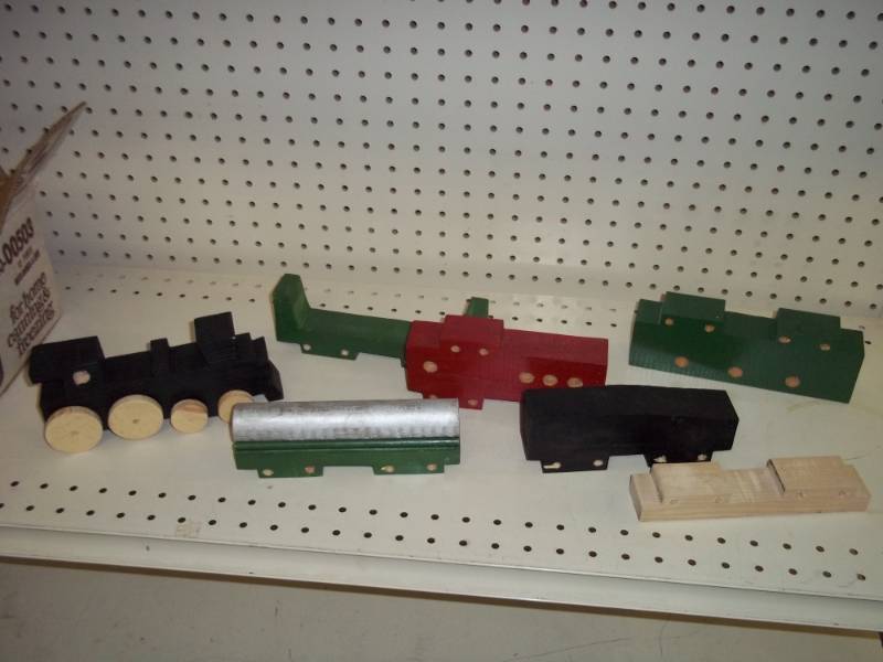 lot 188 image: Wood toy train parts