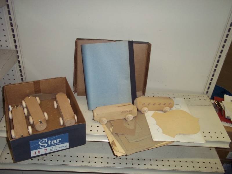 lot 209 image: Wood cars with patterns