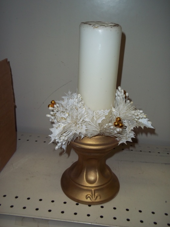 lot 213 image: Candle with gold base