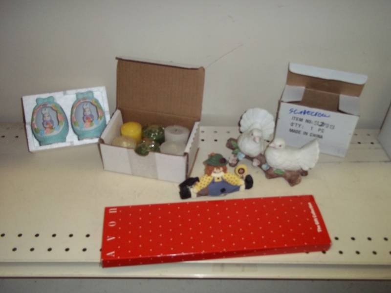 lot 249 image: Scarecrow Avon garden markers Easter eggs