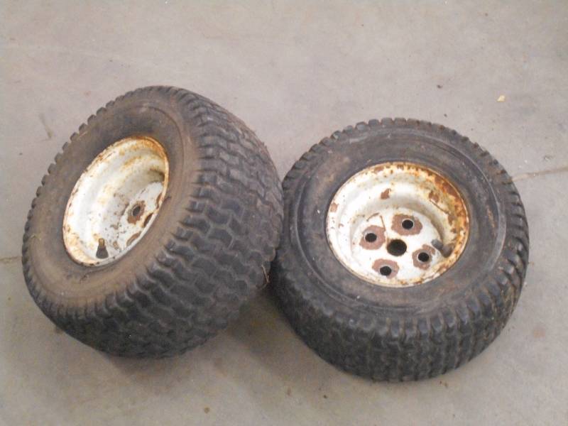 lot 133 image: (2) 136.56 Lawn Mower Wheels & Ti...