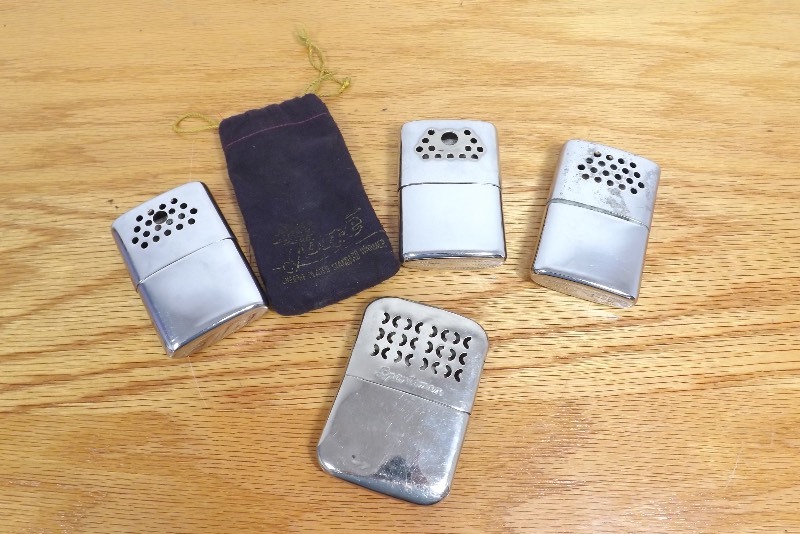 lot 26 image: 4 Vintage JON-E etc. Hand Warmers