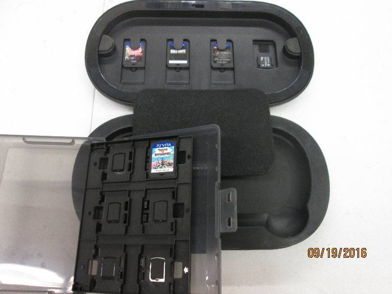 lot 56 image: ps vista  hard carrying case and 4 ...