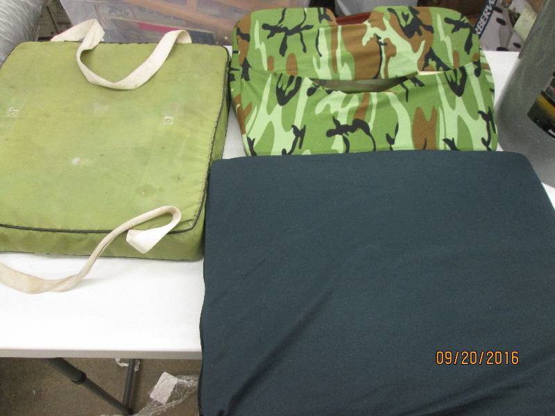 lot 88 image: 3 seat cushions and a new luggable ...