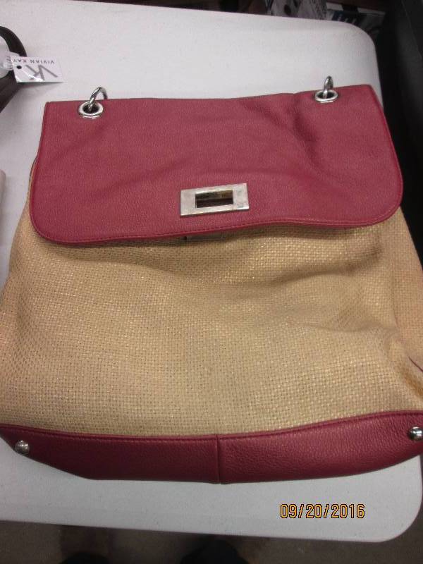 lot 98 image: 1 new purse price tag says $59.00...
