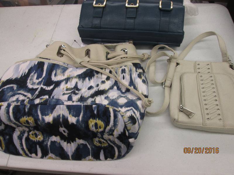 lot 105 image: 3 purses all look new ...